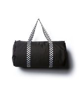 Day Tripper 29 Liter Duffle Bag made of durable polyester material with Nylon handles and removable shoulder strap in Black with Checker Strap