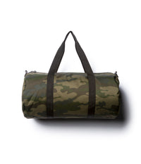 Day Tripper 29 Liter Duffle Bag made of durable polyester material with Nylon handles and removable shoulder strap in Forest Camo