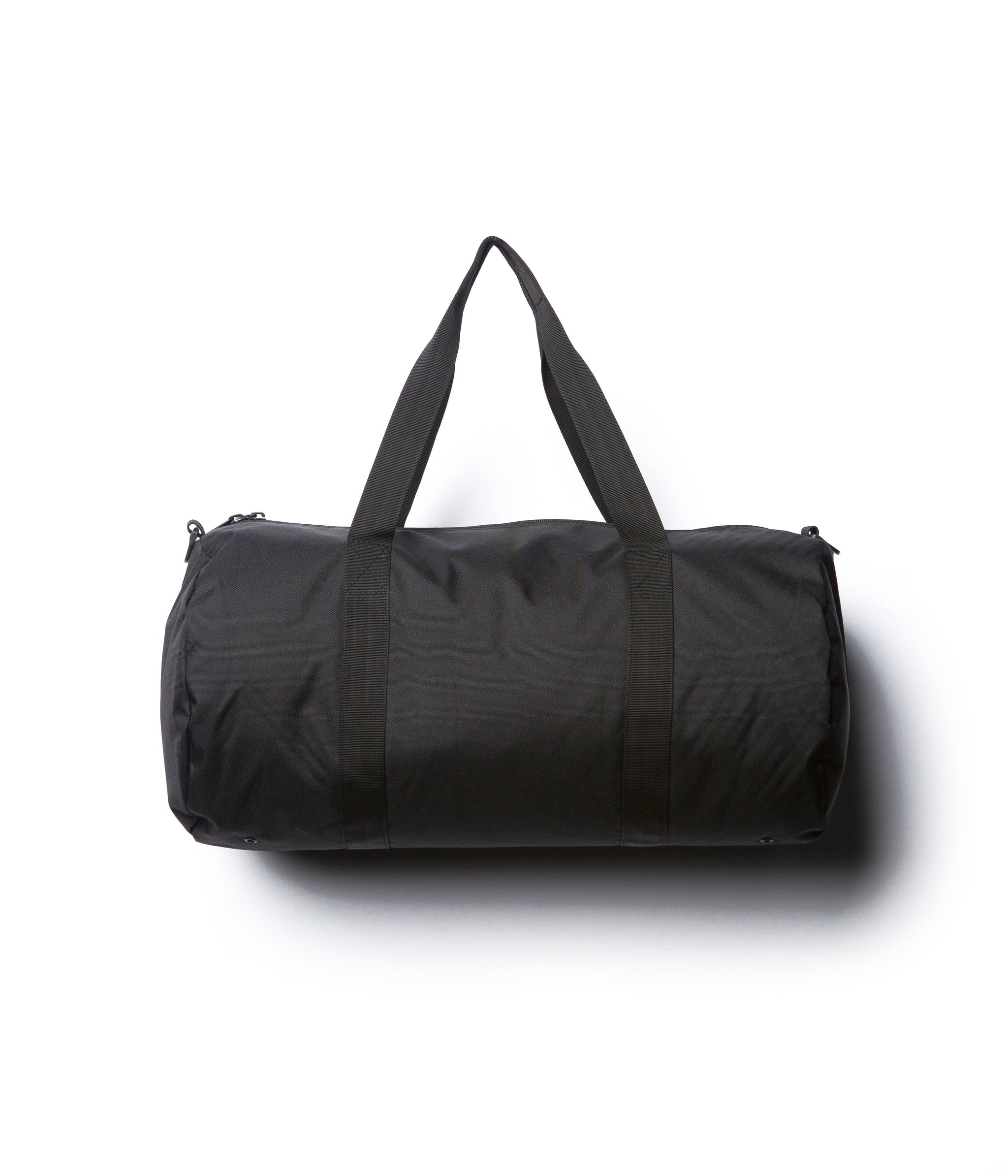 Day Tripper 29 Liter Duffle Bag made of durable polyester material with Nylon handles and removable shoulder strap in Black
