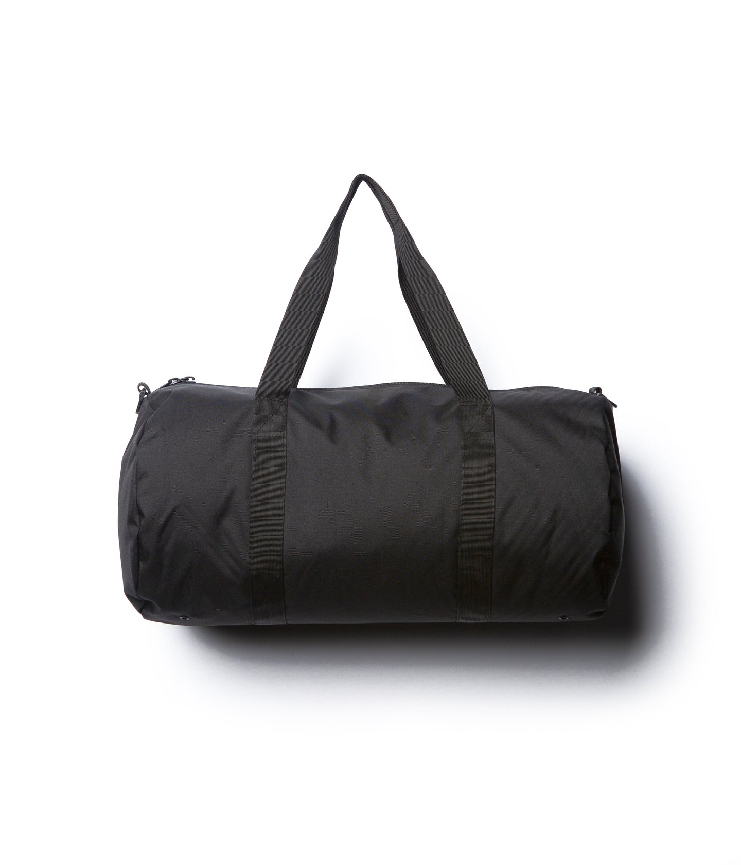 Day Tripper 29 Liter Duffle Bag made of durable polyester material with Nylon handles and removable shoulder strap in Black